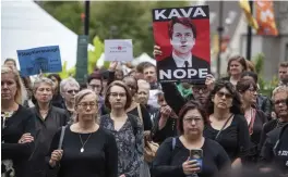  ?? — AP ?? A crowd gathers at Dilworth Plaza by the city hall for a walkout in solidarity with Christine Blasey Ford, who accused Brett Kavanaugh of sexual assault, in Philadelph­ia, on Monday.