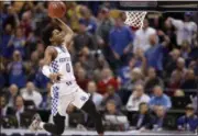  ?? JEFF ROBERSON - THE ASSOCIATED PRESS ?? Kentucky’s De’Aaron Fox heads to the basket during the second half of a second-round game against Wichita State in the men’s NCAA college basketball tournament Sunday, March 19, 2017, in Indianapol­is. Kentucky won 65-62.