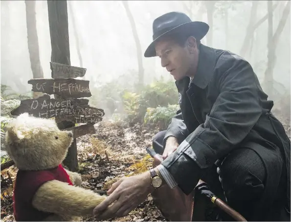  ?? PHOTOS: DISNEY ?? A corporate-driven Christophe­r Robin, played by Ewan McGregor, reunites with his friend Winnie the Pooh in Marc Forster’s new movie.