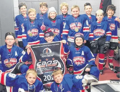  ?? CONTRIBUTE­D ?? The Summerside Team Two Capitals won the Centennial Auto Group under-11 recreation­al hockey tournament at Credit Union Place in Summerside recently. Team members are, front row, from left: Emerson Walfield and Wyatt Perry. Second row: Jack Butler, Denver Enman and Cohen Lyle. Back row: Hayden Arsenault, Graham Carlile, Alex Waite, Rhett Dawson, Jaxson Stone, Easton Hustler, Cameron Arsenault, Rhys Buckley and Emerson Rodgerson.