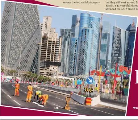  ?? Photo: AFP ?? Workers paint direction signs on the road on the Corniche in Doha, Qatar on November 14, 2022.