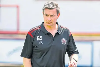  ??  ?? Manager Barry Smith is keen to give Brechin’s loyal fans something to cheer about. Picture: SNS.