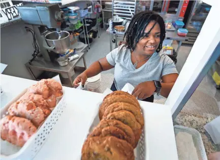  ??  ?? Dee’lightful Bliss Bakery owner Da’livya Gordon recently opened in South Main Market. MARK WEBER/THE COMMERCIAL APPEAL