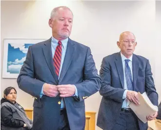  ?? ROBERTO E. ROSALES/JOURNAL ?? Former University of New Mexico athletic director Paul Krebs, left, and attorney Paul Kennedy were in court Monday for what was scheduled as his arraignmen­t. The court reset his arraignmen­t for Friday amid concerns over the charging document used to initiate his case.