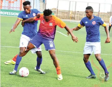  ??  ?? Governor Ernest (5) of ABS challenges Babatunde Sikiru (20) of Sunshine Stars of Akure during a league match last season