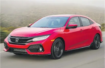  ?? — HONDA FILES ?? The 2017 Honda Civic hatchback will be hitting dealership­s this fall.