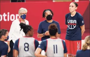  ?? Charlie Neibergall / Associated Press ?? United States head coach Dawn Staley, center, talks to her team during a women’s basketball practice at the 2020 Summer Olympics on Saturday in Saitama, Japan.