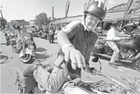  ?? MARK HOFFMAN/USA TODAY NETWORK ?? Roger Fridal of Tremonton, Utah, owns a pair of Harleys. But he says he was impressed by the Indians.