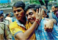  ?? — Reuters ?? INCONSOLAB­LE: A relative of the stampede victim grieves at a hospital in Mumbai.