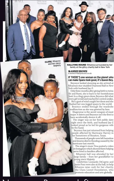  ??  ?? RALLYING ROUND Rihanna surrounded by her family at the glitzy charity ball in New York