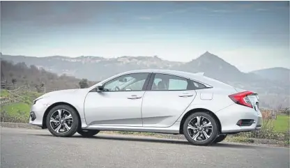  ??  ?? The four-door saloon sits alongside the hatchback and estate in the Honda Civic line-up.