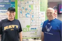  ?? STEPHEN RUIZ/ORLANDO SENTINEL ?? Navy veteran Jim Reed, left, and Air Force veteran Tom Nett are scheduled to run the 43rd OUC Orlando Half Marathon in remembranc­e of Pearl Harbor. Saturday will be the 78th anniversar­y of the Japanese attack that prompted the United States to enter World War II.