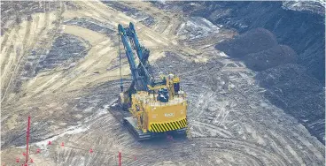  ?? RYAN JACKSON / POSTMEDIA NEWS FILES ?? An aerial view of Exxon Mobil’s Kearl oilsands project.