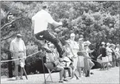  ?? STAN CARROLL/THE COMMERCIAL APPEAL ?? Jason Kokrak, who missed the cut by a shot, hurdles the ropes back onto the 16th fairway during the second round Friday.