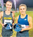  ?? Photo / Jared Smith ?? Rorey Hunter and Tauranga’s Samuel Tanner received commemorat­ive caps for breaking the 4 Minute Mile atCooks Gardens.