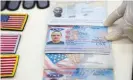  ?? Photograph: Miraflores Palace/Reuters ?? Personal documents allegedly belonging to US ‘mercenarie­s’ are shown displayed at Miraflores Palace in Caracas.