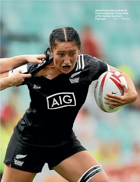  ??  ?? Sarah Goss tries to fend off French defender Chloe Pelle at the Sydney sevens in February.