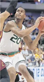  ?? TONY GUTIERREZ/AP ?? Miami forward Dewan Huell has not hired an agent so he can retain his college eligibilit­y.