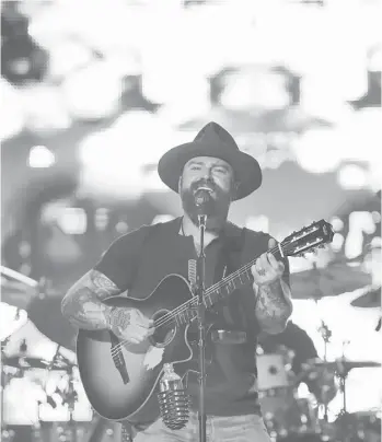  ?? Steve Gonzales / Houston Chronicle ?? Zac Brown of the Zac Brown Band urged rodeo fans to “to try and get lost” in the ballad “Free.”
