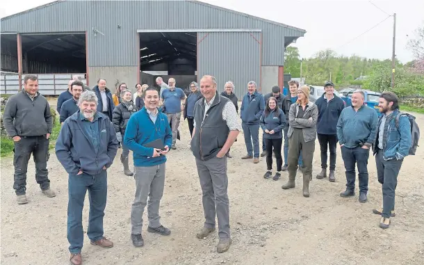  ?? ?? LOOKING FOR ANSWERS: Members of the Just Transition Commission with, in the foreground from left, NFU Scotland president Martin Kennedy, Lang Banks of the commission and Robert Macdonald of Castle Grant Home Farm, Grantown-on-spey.