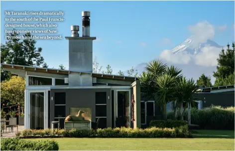  ??  ?? Mt Taranaki rises dramatical­ly to the south of the Paul Francisdes­igned house, which also has expansive views of New Plymouth and the sea beyond.