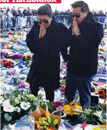  ??  ?? In mourning: Vichai’s widow Aimon and son Top among the tributes yesterday