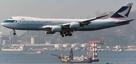  ?? BLOOMBERG PIC ?? Cathay Pacific Airways Ltd is restructur­ing itself to become leaner and more agile.