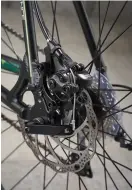  ??  ?? Below Cable disc brakes are the big all-weather control win Bottom The Shimano Claris here is the older version with external cables, but it still works okay