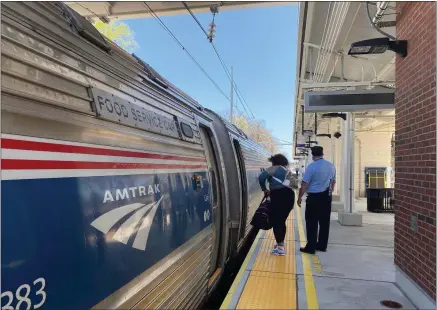  ?? MEDIANEWS GROUP FILE PHOTO ?? A passenger boards the Amtrak train at the Paoli station. Work progresses on plans to return rail service to Reading.