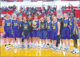  ?? Submitted photo ?? FLOCK TOGETHER: Lakeside’s senior high girls’ basketball team celebrate their tournament win Saturday in Fordyce after defeating Smackover, 55-38.