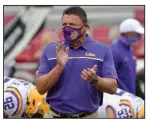  ?? (AP/Michael Woods) ?? LSU Coach Ed
Orgeron said his Tigers (33), which went 15-0 and won a national title last year, is going through some growing pains that he believes will pay off in the end.