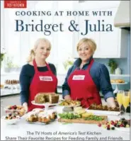  ?? AMERICA’S TEST KITCHEN VIA AP ?? This undated photo provided by America’s Test Kitchen shows the cookbook “Cooking at Home with Bridget & Julia.”
