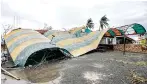  ??  ?? A collapsed shade at a roadside eatery in Kodinar