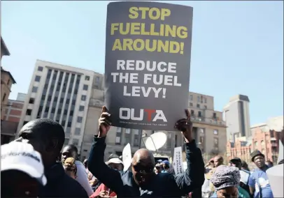  ?? PICTURE: OUPA MOKOENA/AFRICAN NEWS AGENCY (ANA) ?? Scores of civil society organisati­ons and political parties gathered outside National Treasury offices in Pretoria to protest against high fuel tax levies.