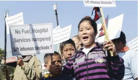  ??  ?? KATHMANDU: Nepalese activists and hospital patients rally against the block on humanitari­an supplies at the Nepal-India border, in Kathmandu yesterday. Nepal is heavily dependent on India for fuel and other supplies, but little cargo has crossed the border from India since protests against the constituti­on broke out in late September. — AFP