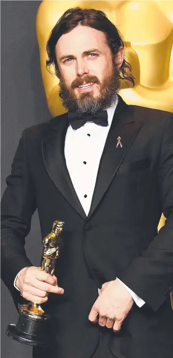  ?? Picture: GETTY IMAGES/AFP ?? HOT WATER: Casey Affleck, who has been accused of sexual harassment, has pulled out of a date to present the Oscar for Best Actress winner.