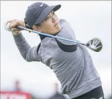  ?? Kenny Smith/Associated Press ?? Michelle Wie shot a 64 in the first round of the Women’s British Open Thursday for a one-stroke lead.