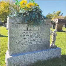  ?? GORD HOLDER. ?? A grave marker in the Cimetière Très Sainte-Trinité in Clarence-Rockland, Ont., shows the names of four members of the Hotte family, including the parents of Rémi Hotte and his son Michel. When Rémi died, he left behind a wife and four children, who rarely spoke of the tragedy.