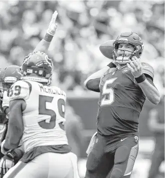 ?? Brett Coomer / Houston Chronicle ?? Winning a division title has not eased the scrutiny placed on Jaguars quarterbac­k Blake Bortles.