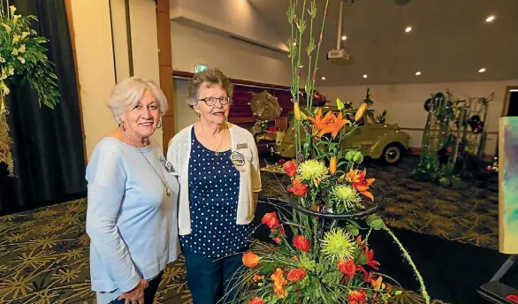  ?? SIMON O’CONNOR/STUFF ?? Organiser’s Raewyn Wolfe, left, and Beryl Watson both had entries in the floral art competitio­n.