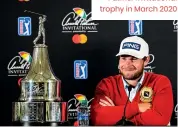  ??  ?? With the Arnold Palmer Invitation­al trophy in March 2020