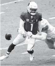  ?? ROSS D. FRANKLIN AP ?? Pressure by Dolphins’ DE Emmanuel Ogbah forced Arizona quarterbac­k Kyler Murray to fumble in their Nov. 8 game.