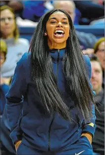  ?? SEAN D. ELLIOT/THE DAY ?? UConn’s Evina Westbrook shouts encouragem­ent to her teammates during a women’s basketball game against Cal on Nov. 10, 2019, at Gampel Pavilion. Westbrook, who sat out last year due to NCAA transfer requiremen­ts, has been named one of the Huskies’ captains this season and is settling in to her new role.
