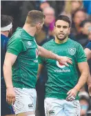  ??  ?? Ireland's Conor Murray (right) after scoring his try against Scotland.