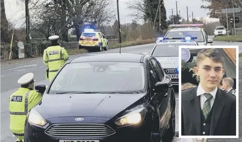  ??  ?? 0 Police stop and question motorists in their hunt for Aberdeen schoolboy Liam Smith, inset, who has been missing since 17 November