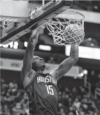  ?? Godofredo A. Vasquez / Staff photograph­er ?? Rockets center Clint Capela converts a dunk for two of his 18 points in the win over the Pacers. Capela was 8-for-9 from the field in the 115-103 victory at Toyota Center on Sunday.