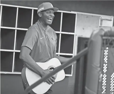  ??  ?? Memphis Tigers coach Penny Hardaway jokes around before smashing a guitar to start the 901 FC match against Nashville SC at Autozone Park on Wednesday. JOE RONDONE/THE COMMERCIAL APPEAL