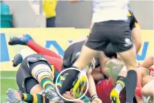  ?? Footage of the game between Northampto­n and Harlequins shows Kyle Sinckler rip off Saints’ Michael Paterson’s scrum cap (far left) and his hand making contact with his eye area (centre and right). After an exchange between referee Luke Pearce and Saints c ??