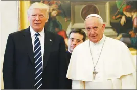  ?? AP PHOTO ?? U.S. President Donald Trump stands with Pope Francis during a meeting yesterday at the Vatican.