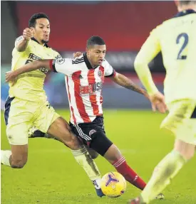  ?? AP ?? Sheffield United’s Rhian Brewster (centre) in action against Newcastle during the 2020-21 English Premier League season.